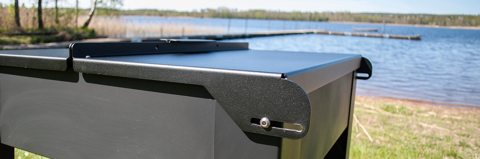 Close up of a grill lid, it covers the outdoor BBQ.